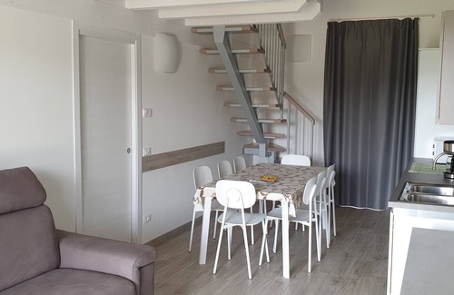 Desenzano del Garda Apartment | Experience Apartment Esmera: 2 Rooms, Pool & Ocean Views