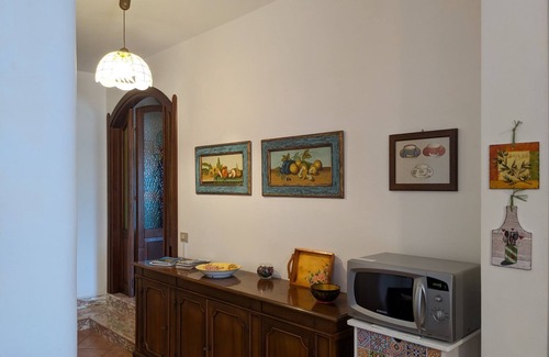 Lu Bagnu Apartment | Cozy Apartment Steps from the Sea with Oceanfront Pool