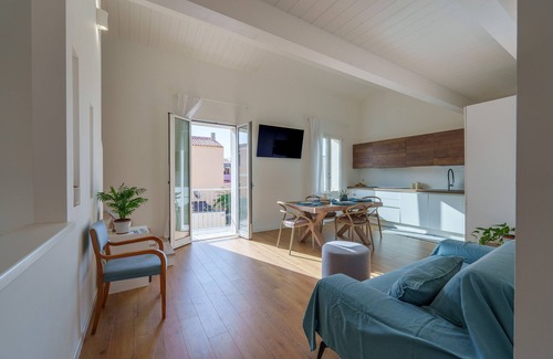 Santa Teresa di Gallura Apartment | Oceanfront Apartment 'Rena Bianca' with Balcony & Wi-Fi
