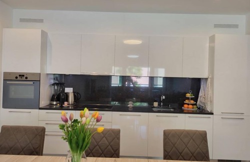 Caslano Apartment | Experience Oceanfront Comfort at App. Julia by Interhome