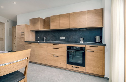 Bressanone Apartment | Cozy Apartment 'Kanzi' with Mountain Views and Garden Access
