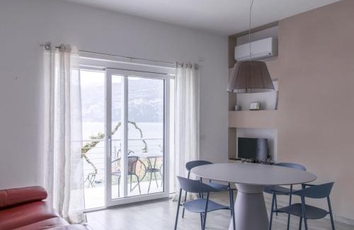 Magugnago Apartment | Oceanfront Haven: Apartment La Maison Blanche-1 Awaits