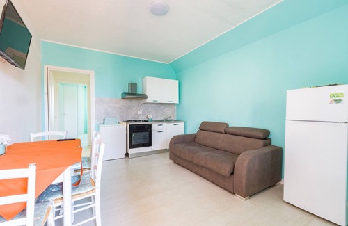 Patti Apartment | Apartment 'La Risacca Suite' with Sea View, Private Terrace and Air Conditioning