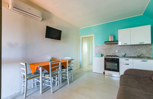Patti Apartment | Apartment 'La Risacca Suite' with Sea View, Private Terrace and Air Conditioning
