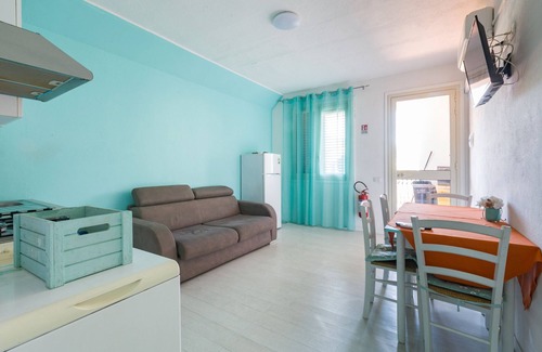 Patti Apartment | Apartment 'La Risacca Suite' with Sea View, Private Terrace and Air Conditioning