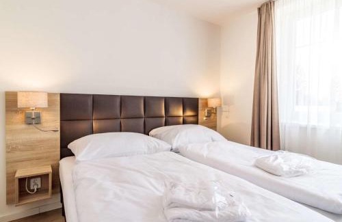 Lojzova Paseka Apartment | Elegant Lakeside Village 9: Oceanfront & Pet-Friendly Retreat