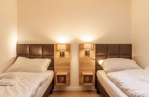 Lojzova Paseka Apartment | Elegant Lakeside Village 9: Oceanfront & Pet-Friendly Retreat