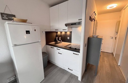 Soorts-Hossegor Apartment | Le Capitaine Apartment: Poolside Retreat with Family Amenities