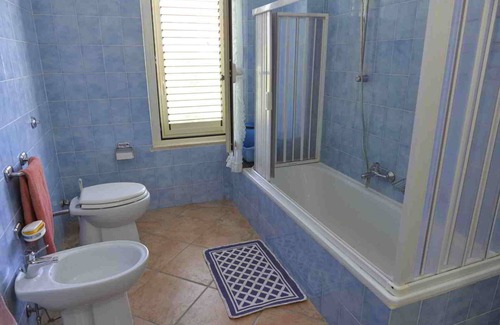 Bari Sardo Apartment | Cozy Apartment 'Mare Blu' with Shared Garden & Ocean Views