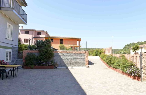 Bari Sardo Apartment | Cozy Apartment 'Mare Blu' with Shared Garden & Ocean Views