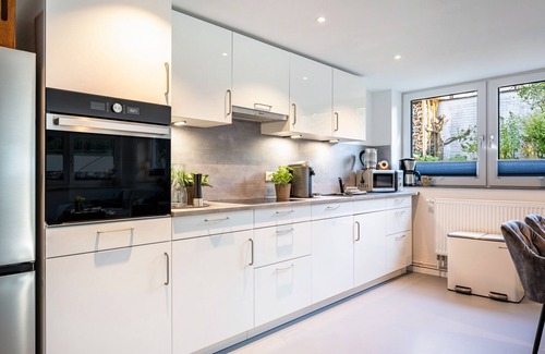 Brodten Apartment | Discover Apartment 'Meerlust' with Private Terrace & Garden