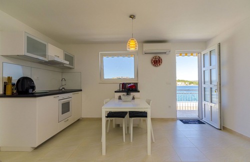 Podglavica Apartment | Rogoznica Retreat: Apartment Mirjana with Pool & Ocean View
