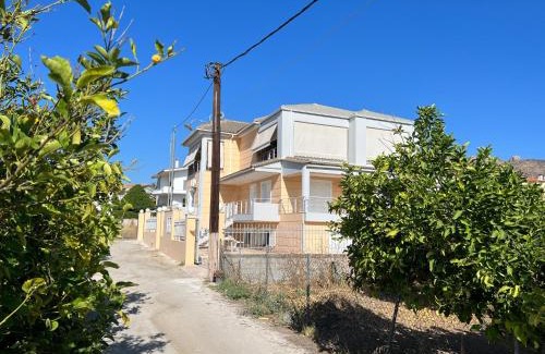 Loutra Oraias Elenis House | Cozy Apartment Mitrou 2: Family-Friendly & Highly Rated Stay