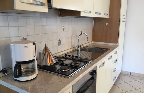 Castelletto Apartment | Scenic Lake View Apartment in Margherita House - Rated 9/10