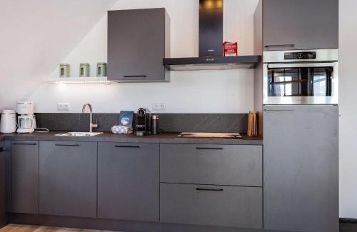 Offingawier Apartment | Cozy Apartment by Beautiful Sneekermeer with Great Amenities