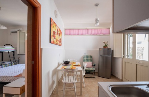 Sant'Isidoro Apartment | Relaxing Apartment 'Oasi Del Conte' with Ocean View Terrace