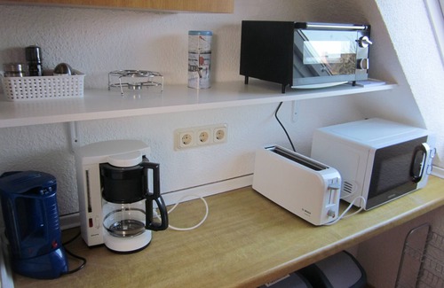 Norddeich Apartment | Quiet Garden Retreat with Pool and Ocean View - Rated 9.8