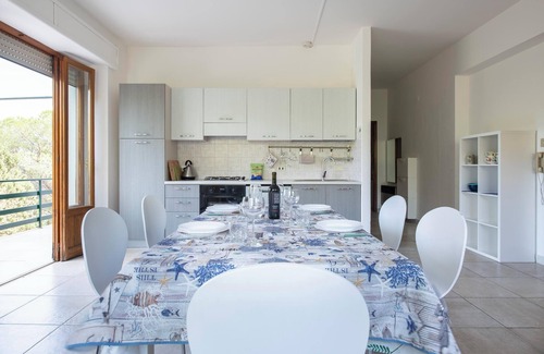 Cala Gonone Apartment | Discover Apartment Oriente: Wi-Fi, Garden & Terrace Retreat