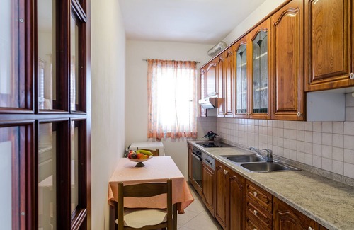 Gorica Apartment | Seaside Retreat: Apartment Paco with Balcony & Spa Amenities