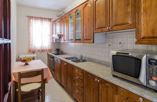 Gorica Apartment | Seaside Retreat: Apartment Paco with Balcony & Spa Amenities