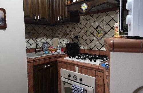 Monte Po-Nesima-San Leone-Rapisardi Apartment | Discover Porta Garibaldi: Family-Friendly Retreat with Pool