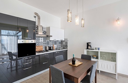 Pulciano Apartment | Scenic Residence Virgilio Green: Lake View & Top Amenities