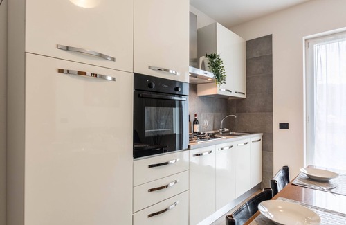 Malcesine Apartment | Mountain View Apartment with Pool, Wi-Fi & Spa Amenities