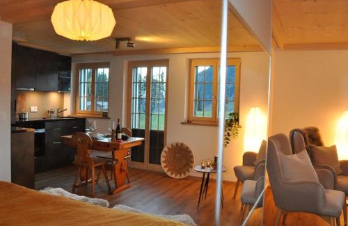 Saanen Apartment | Apartment Tüllerhus Studio by Interhome