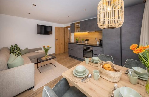 Bruck an der Grossglocknerstrasse Apartment | Discover Top 2 by Interhome: Pet-Friendly Lake View Retreat