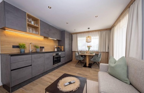 Bruck an der Grossglocknerstrasse Apartment | Discover Top 2 by Interhome: Pet-Friendly Lake View Retreat