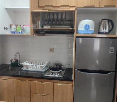 Depok Apartment | Inviting TransPark Cibubur Apartment with Pool & Ocean View