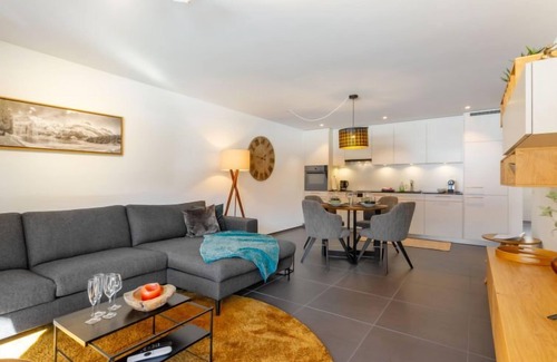 Blausee Apartment | Experience Verena by Interhome: Guest Rated 9.6 with Spa & Lake View