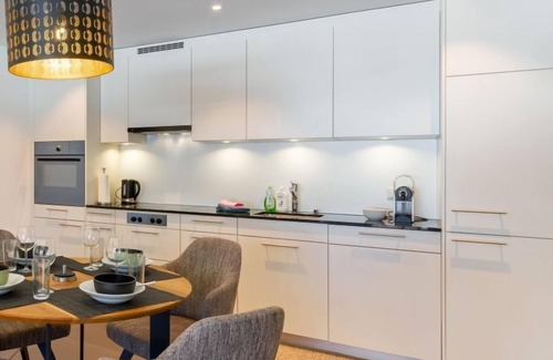 Blausee Apartment | Experience Verena by Interhome: Guest Rated 9.6 with Spa & Lake View