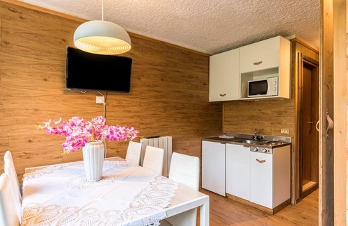 Marilleva Apartment | Mountain View Apartment 'Volpi' with Shared Terrace Access
