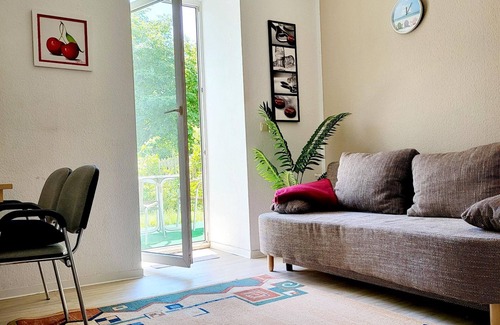 Reusa Apartment | Cozy Westend Apartment with Kitchen & Child-Friendly Amenities