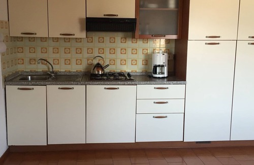 Castelletto Apartment | Tranquil Apartment with Lake View, Garden & Terrace Space