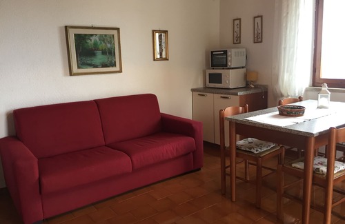 Castelletto Apartment | Tranquil Apartment with Lake View, Garden & Terrace Space