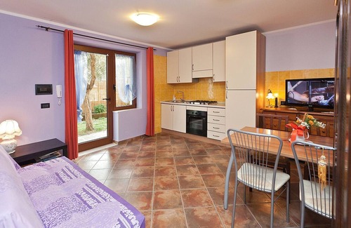 Toscolano Maderno Apartment | Garden Apartment Steps from Beach in Toscolano Maderno