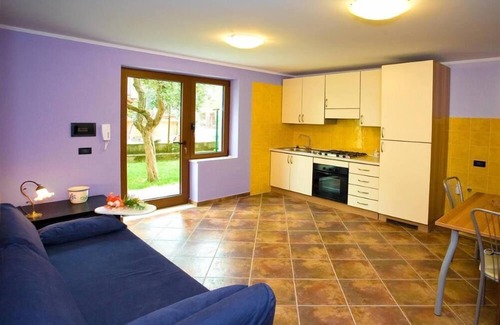 Toscolano Maderno Apartment | Garden Apartment Steps from Beach in Toscolano Maderno