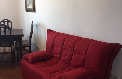 Scansano Apartment | Scenic Apartment with Kitchen and Breakfast Included