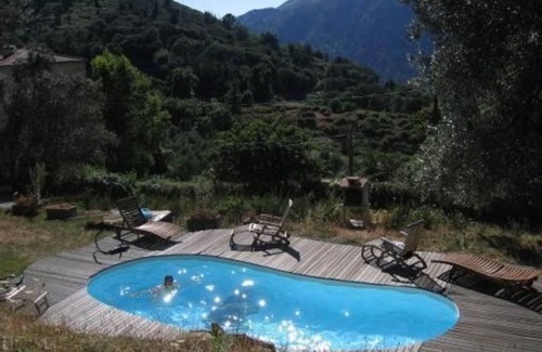 Olmiccia Apartment | Chalet Retreat with Pool & Balcony, Rated 9.2/10