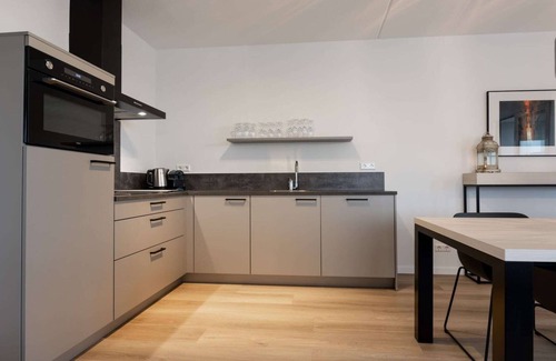 Kamperland Apartment | Scenic Apartment with Accessible Amenities for Families