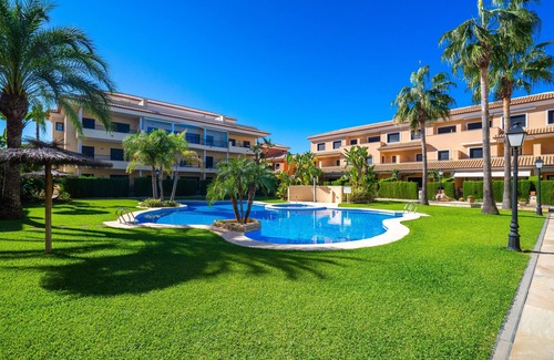 Platja de l'Arenal Apartment | Oceanfront Apartment with Pool in Javea for 8 Guests
