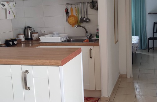 Latina House | Cozy Apartment with Garden Near Latina's Heart