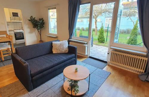 Hasselby Apartment | Cozy Apartment with Garden Steps from Metro Access