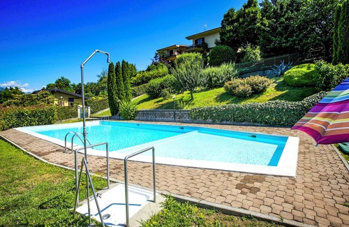 Luino Apartment | Cozy Apartment with Garden Terrace and Pool Access