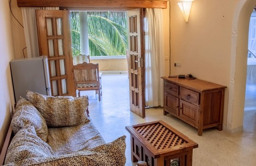 Malindi Apartment | Inviting Apartment with Pool Steps from the Beach