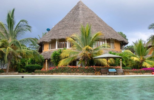 Malindi Apartment | Inviting Apartment with Pool Steps from the Beach