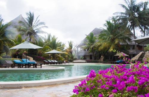 Malindi Apartment | Inviting Apartment with Pool Steps from the Beach