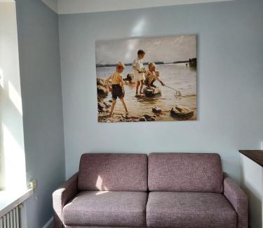 Kluuvi Apartment | Apartment with roof view next to Railway station